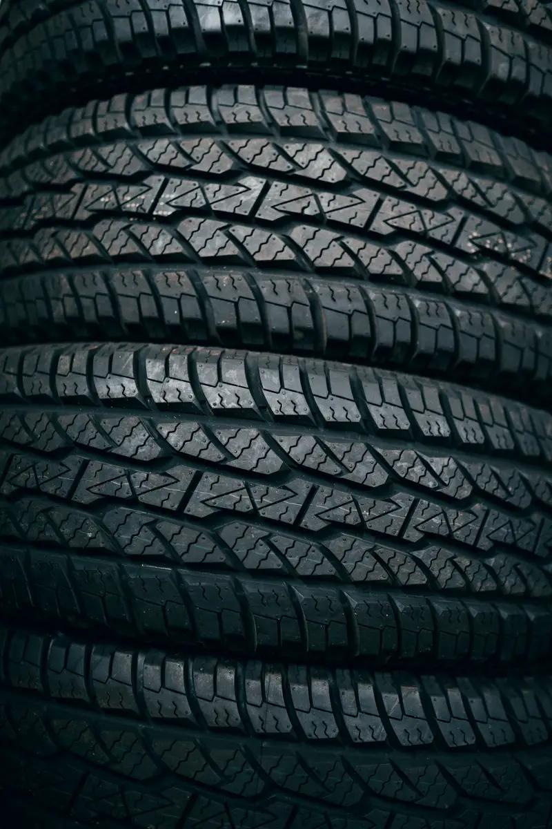 Close-up of the deep tread on a set of new car tyres