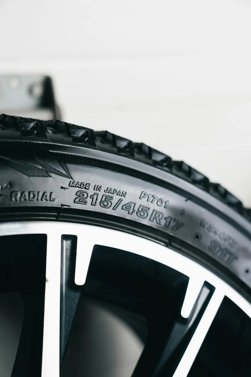 Tyre sidewall showing the size 215/45 R17 marked on the rubber